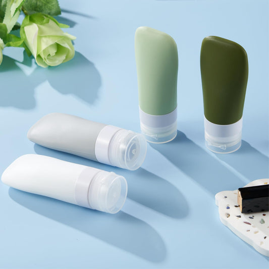Ensvit Portable Travel Bottles, TSA Approved Toiletry Containers, Leak-Proof Squeezable Silicone Tubes, Refillable Travel Accessories for Shampoo, Body Wash, and Liquids 4 Pack,